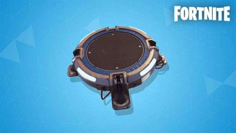 The launch pad, which looks like similar to a round trampoline, but with three large legs that bolt it to a surface.