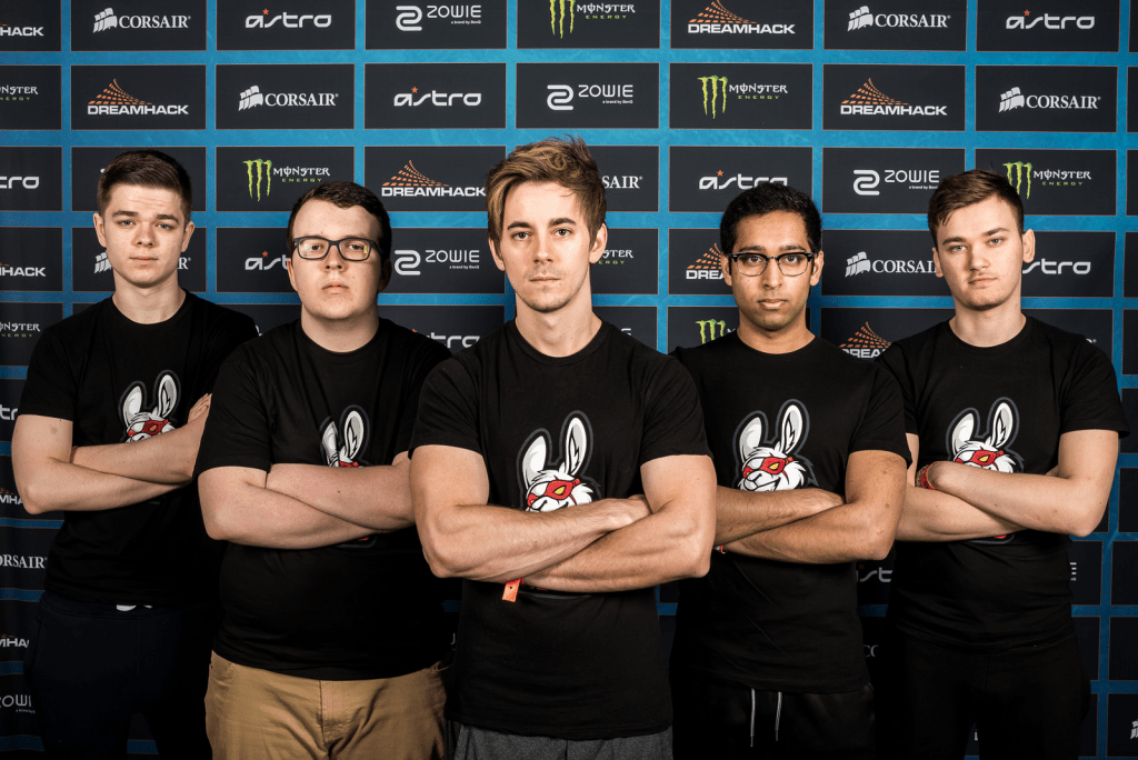 The former Misfits Gaming roster, including Khan and Mims stnd against the wall at Dreamhack