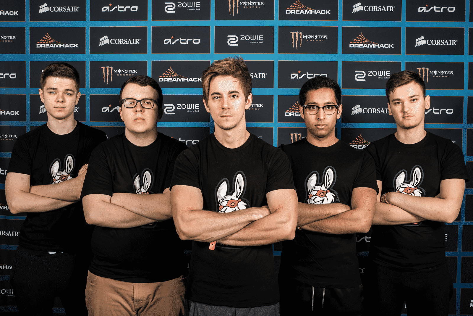 The former Misfits Gaming roster, including Khan and Mims stnd against the wall at Dreamhack