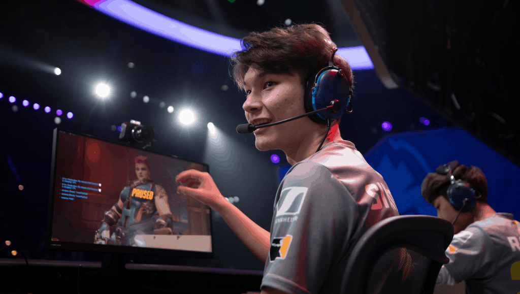 Sinatraa looks over his shoulder at a team mate after securing a kill with Zarya during a game of Overwatch.