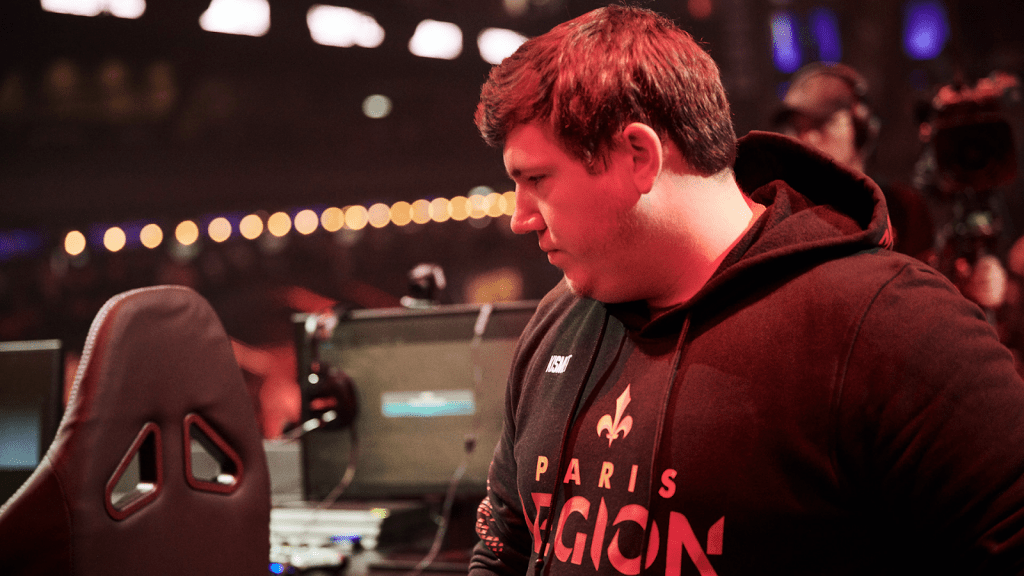 Members of the Paris Legion check their PC's ahead of a game