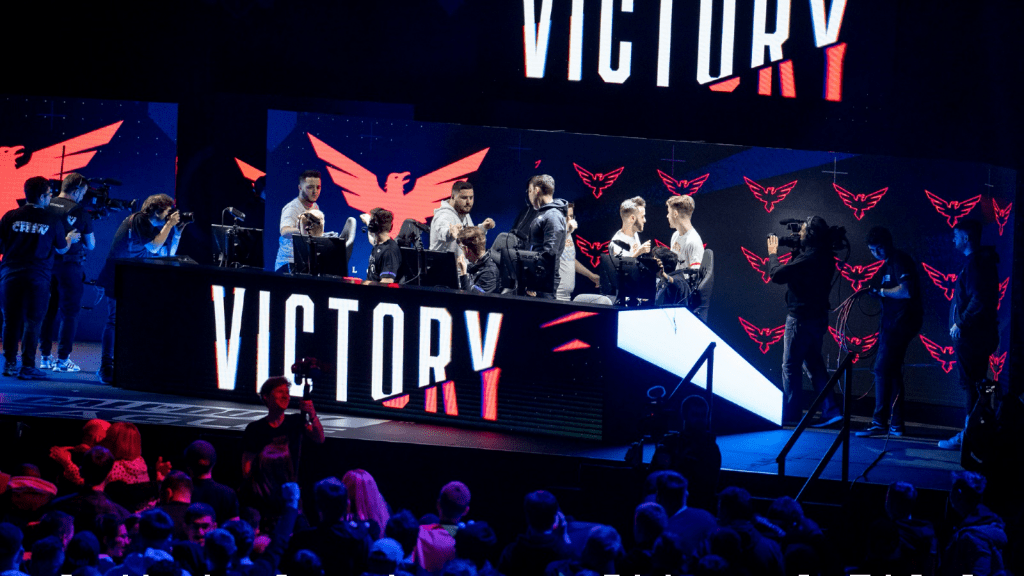 The London Royal Ravens celebrate on stage after a win