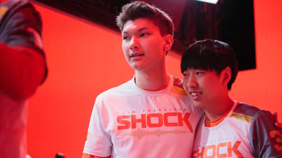 Architect embraces fellow team mates from San Francisco Shock after a win