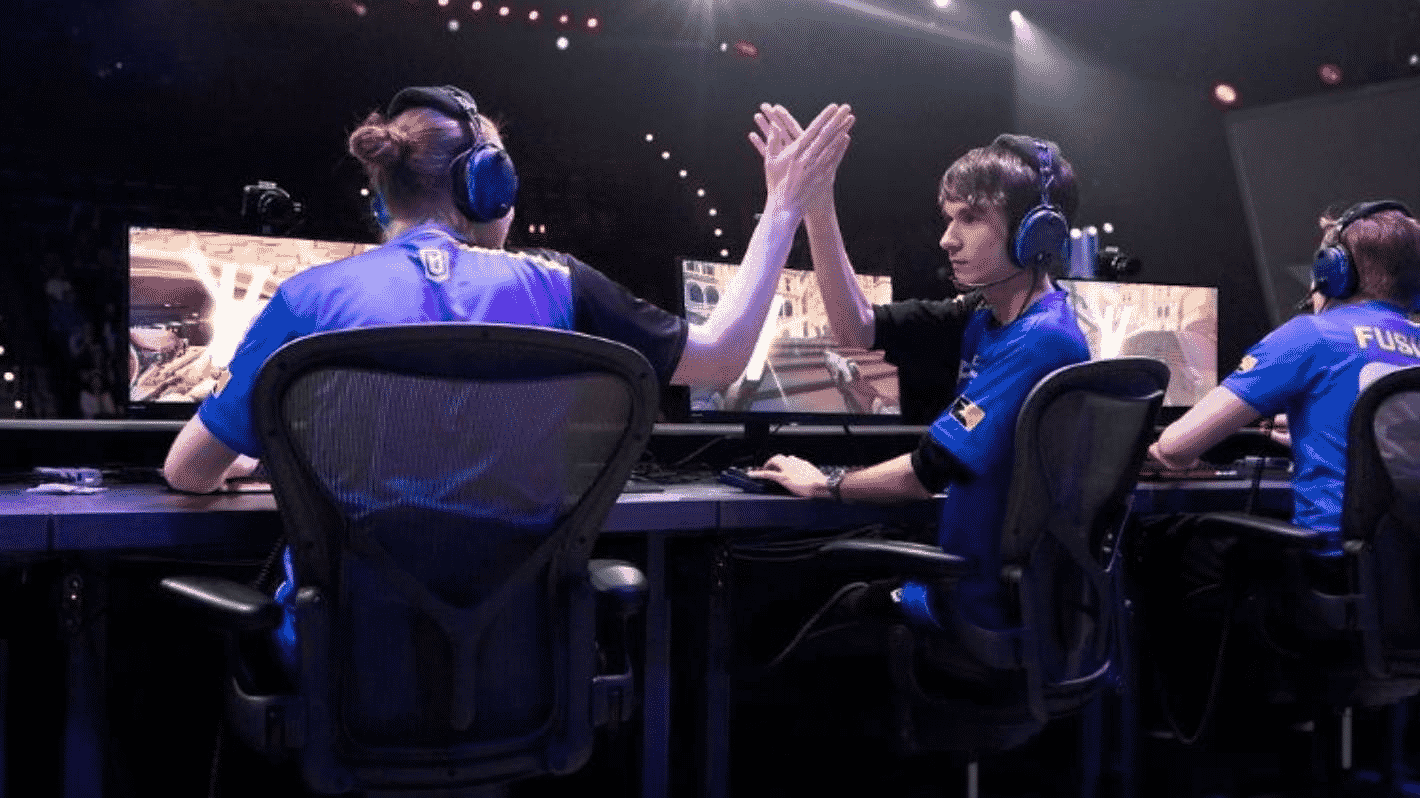 Brussen hi-5's and celebrates with team mates after Boston Uprising take a win.