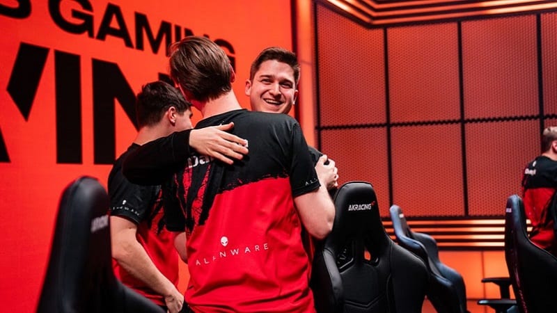 Misfits Gaming's Febiven and Dan Dan hug after a victory