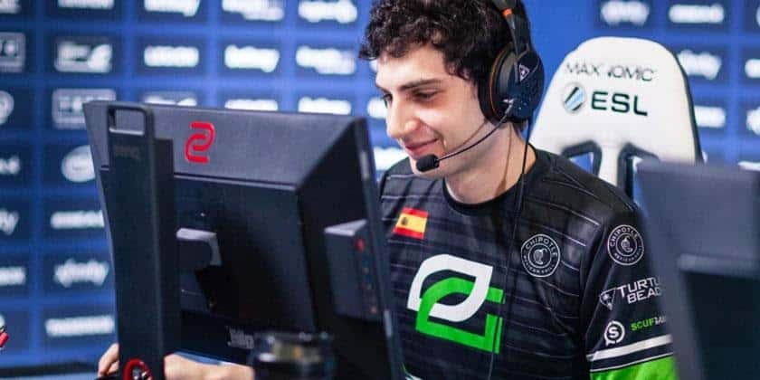 CS:GO player Mixwell looks happily at a computer monitor