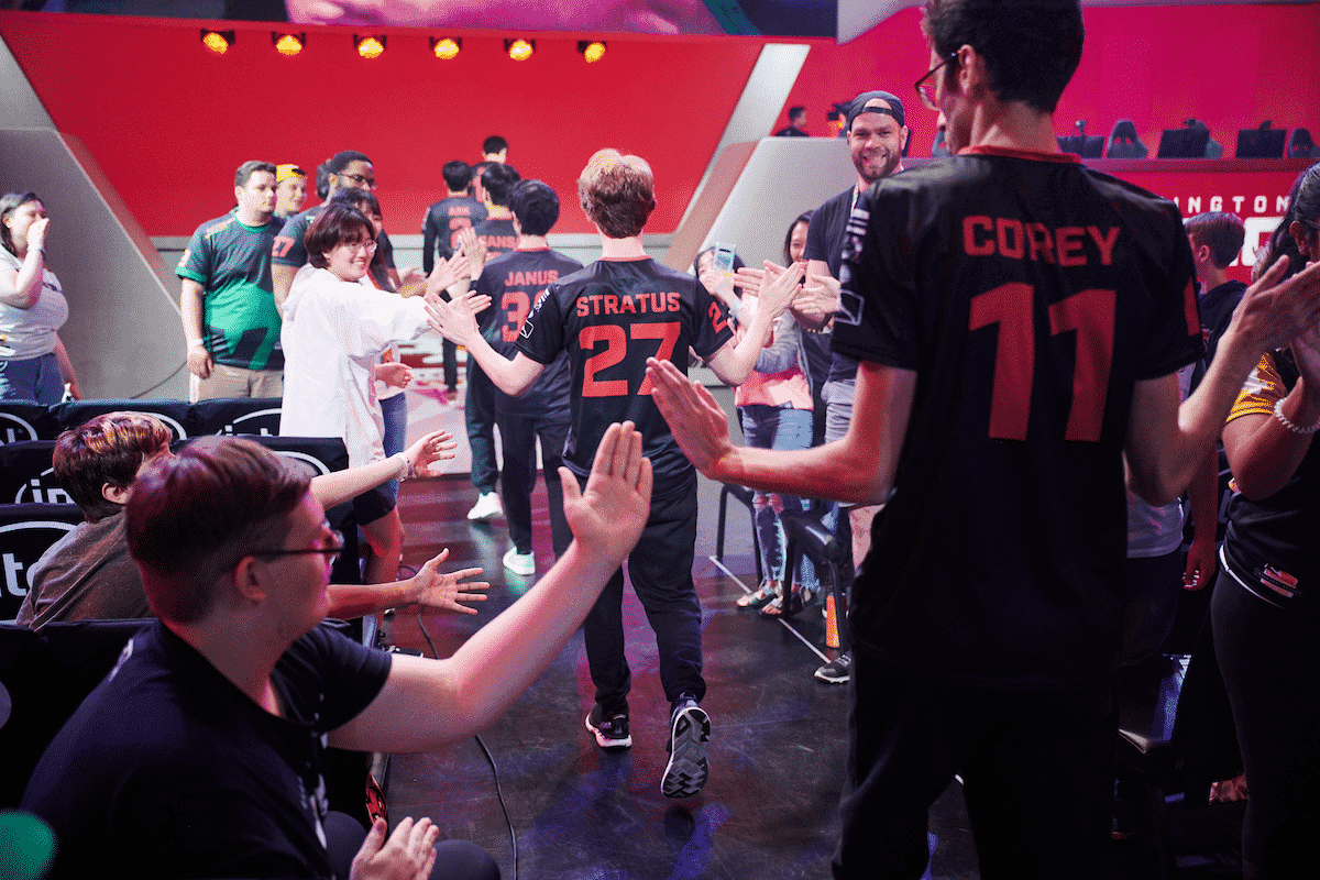 Ellivote and fellow Washington Justice team mates give the live audience hi fives on their way to the stage