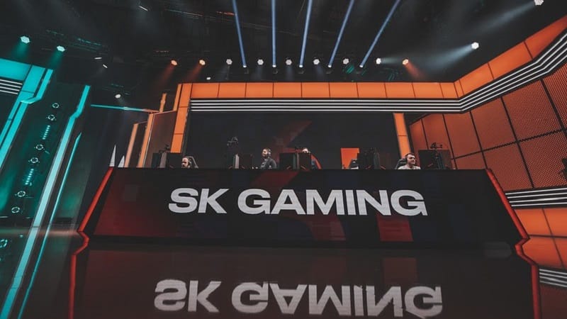 The LEC studio's stage with "SK Gaming" projected on a monitor