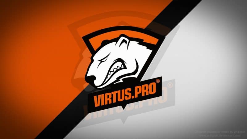 The Virtus.pro logo on a white bear baring its teeth appears over a orange and white background intersected by a black line
