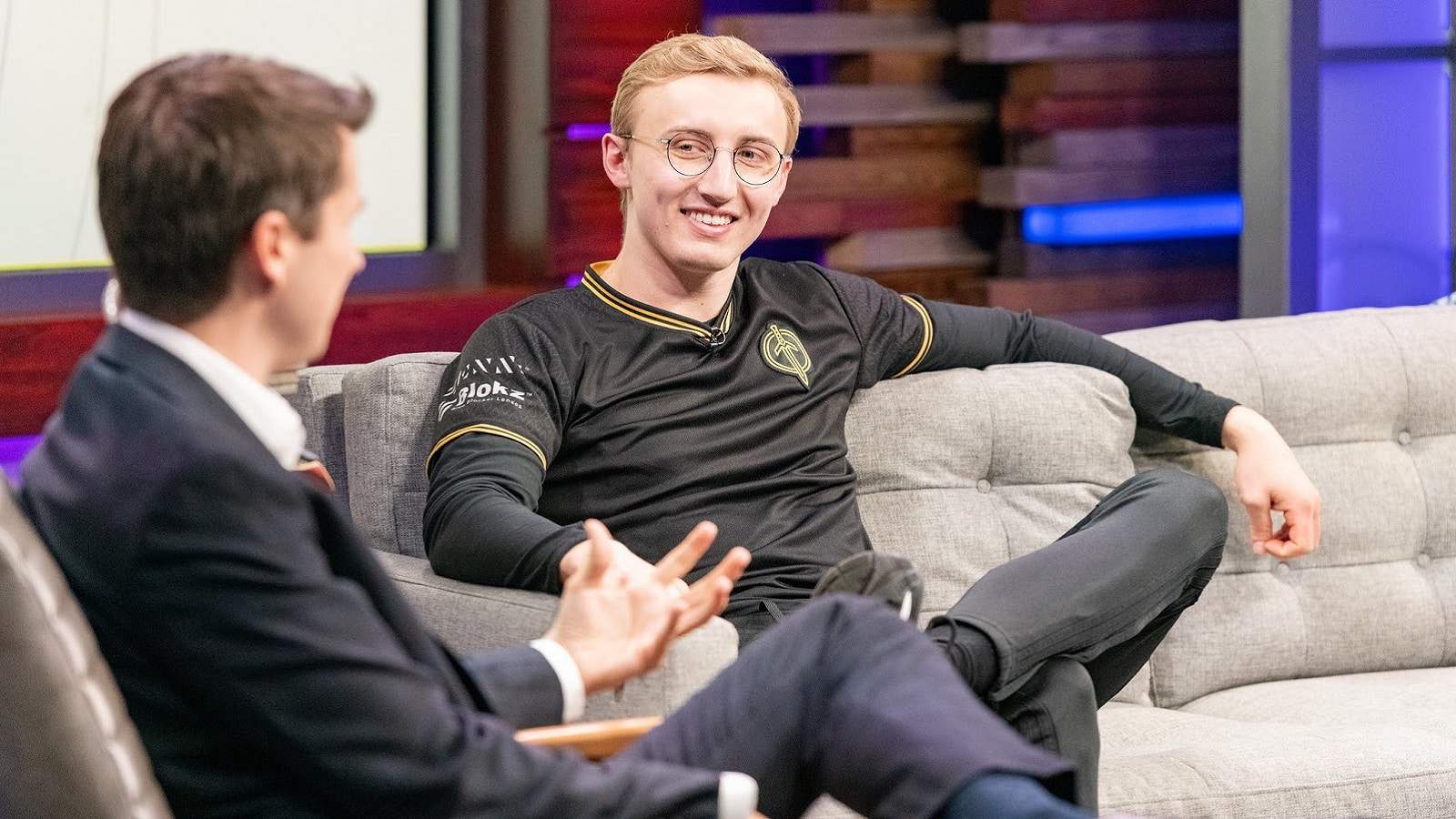 League of Legends player Goldenglue smiling with an LCS host during an interview