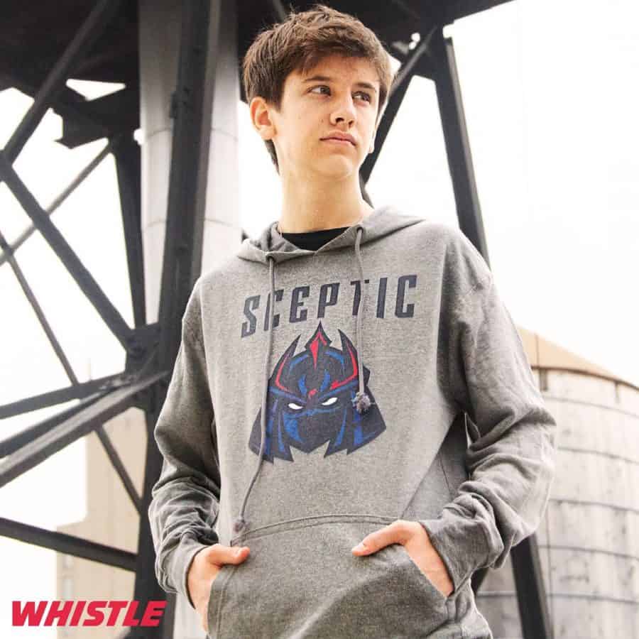 Fortnite streamer and pro player Sceptic poses with a hoodie for his merch line