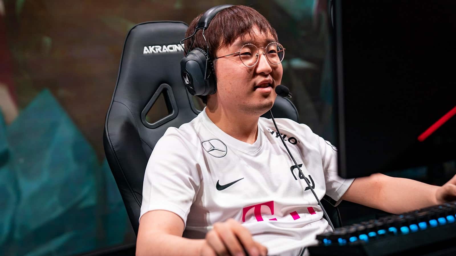 Pro League of Legends player Kim “Trick” Gang-yun plays on a computer in an SK Gaming jersey