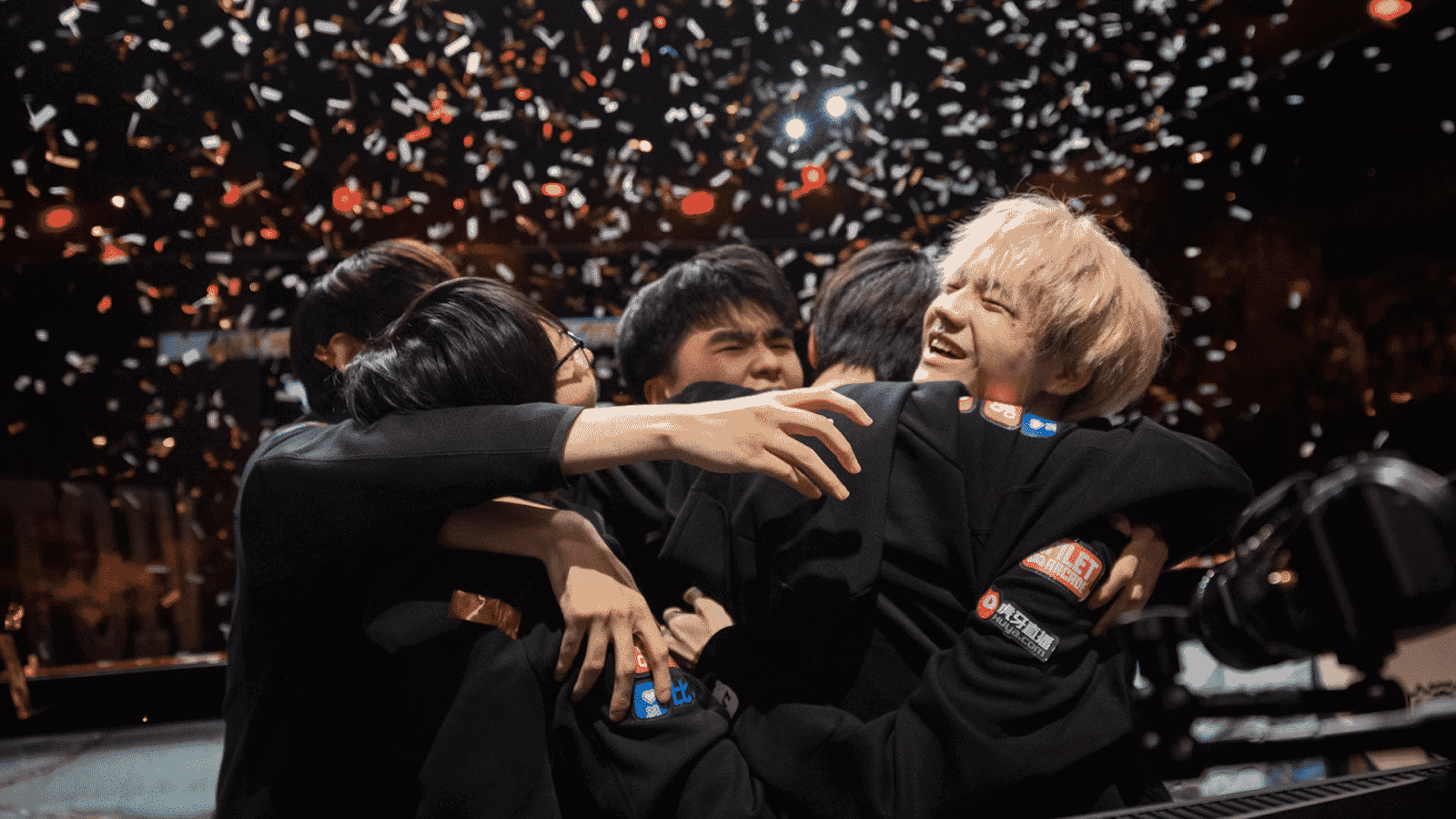 The FunPlus Phoenix (FPX) LoL team celebrating in confetti after winning the 2019 World Championship