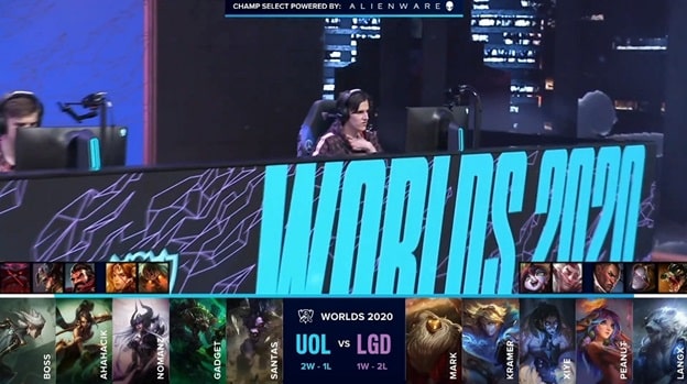 A UOL member preparing for a game on stage with the UOL and LGD drafts below