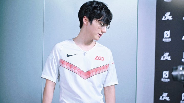 Peanut stands in his LGD jersey, looking off camera