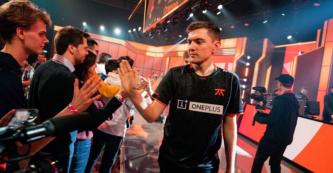 Fnatic's LoL player Selfmade high fiving fans after a match win in the LEC arena
