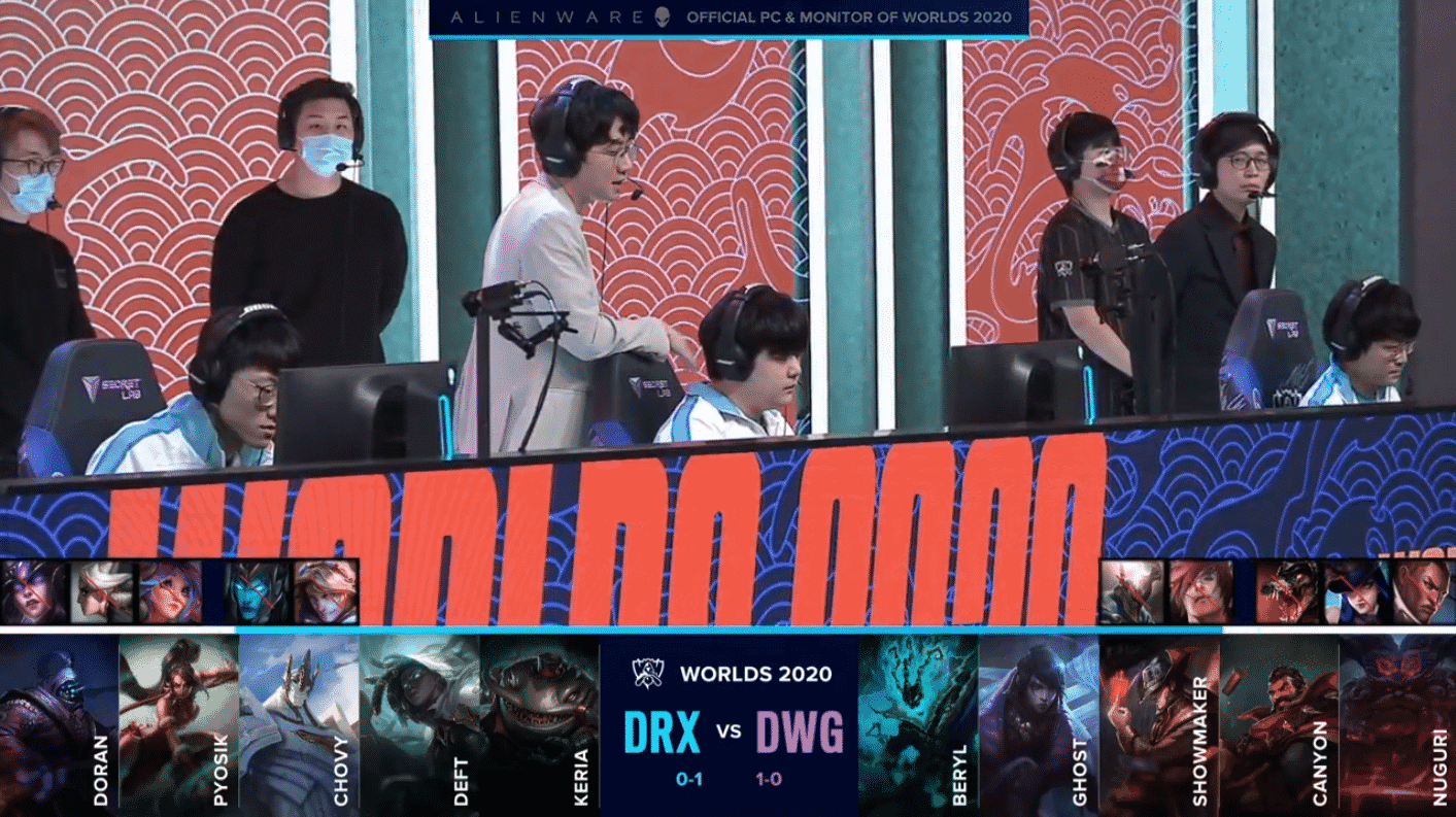 The Damwon LoL team on the Worlds 2020 stage getting ready for a game versus DRX with their game two drafts below