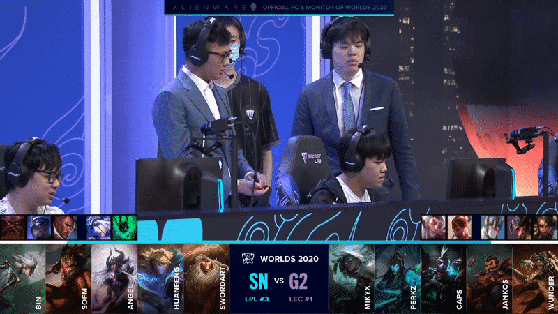 The Suning LoL players and coaches before a Worlds 2020 match against G2 Esports with the teams' drafts below
