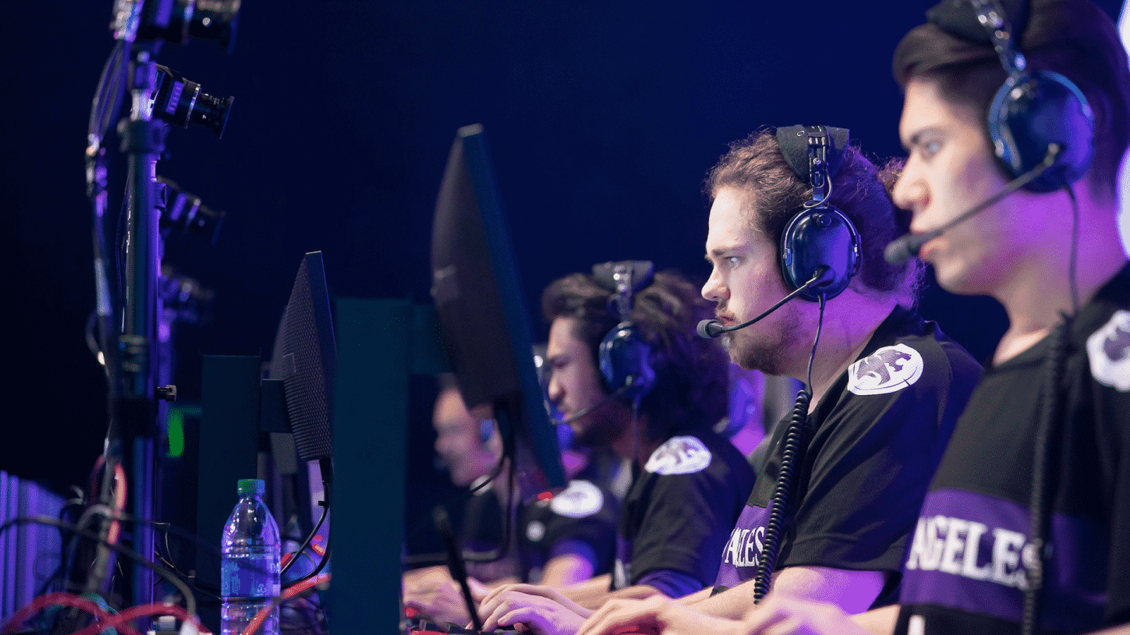 The LA Gladiators Overwatch League team playing a match on stage together