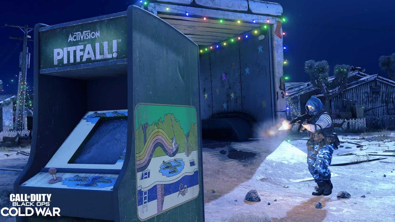 An old style arcade machine appears in a snow sprinkled fair ground while an agent in camo gear sneaks around it