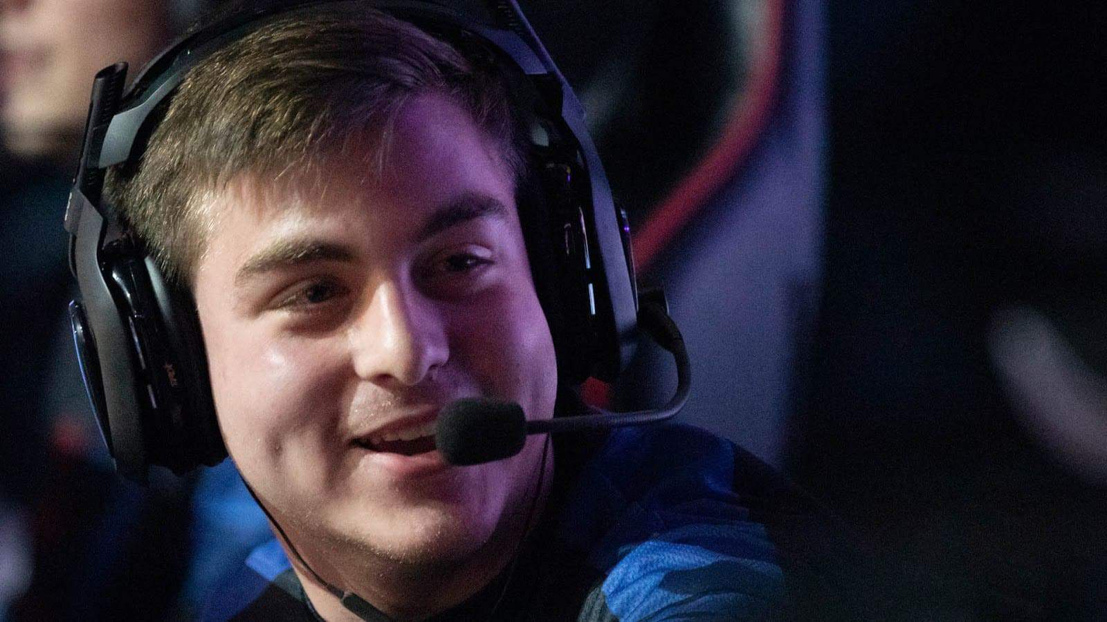 Chris “Simp” Lehr smiles as he speaks with a team mate during a live CDL match