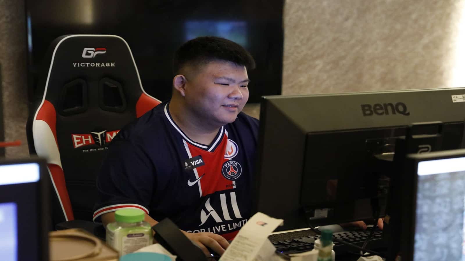 Zhao "XinQ" Zixing enjoying some scrims at the practice house with PSG.LGD