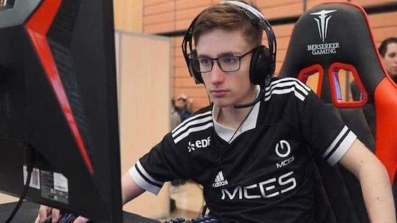  Alexandre "Andilex" Christoph sits at his PC with his headset on, getting ready for a game of Fortnite