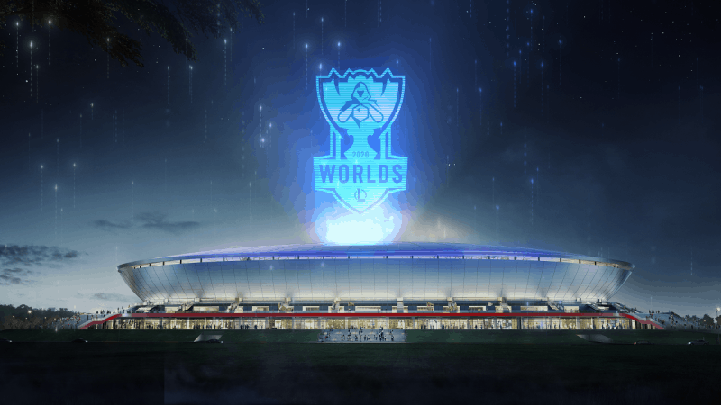 The League of Legends Worlds 2020 logo appears over the Pudong Soccer Stadium in China, lit up by lights at night