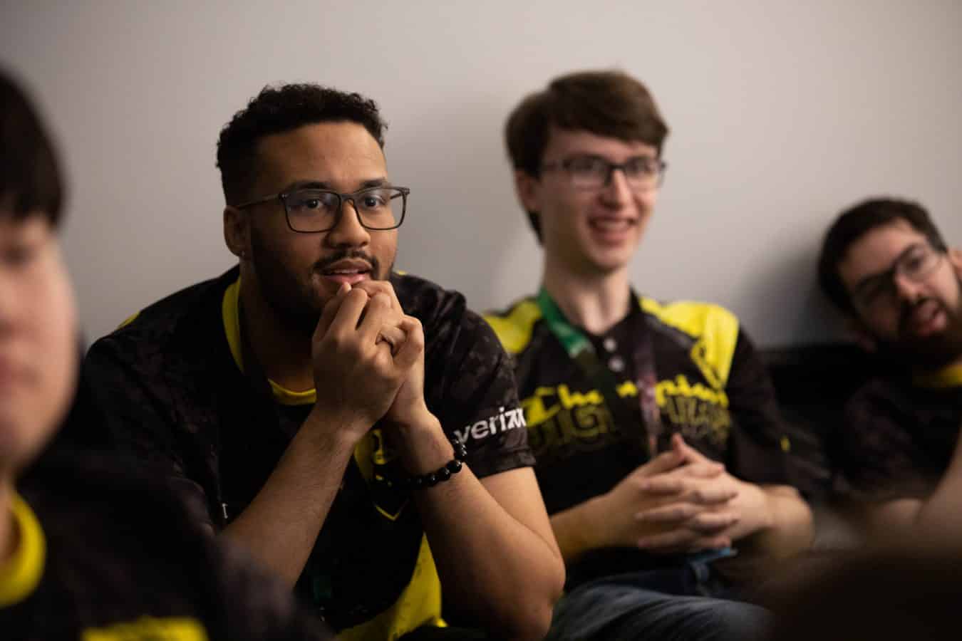 Pro LoL player Zaqueri "Aphromoo" Black sits with his Dignitas teammates