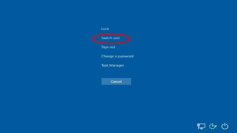 A Windows 10 Ctrl Alt Del screen with the "Switch User" option circled in red all on a blue background