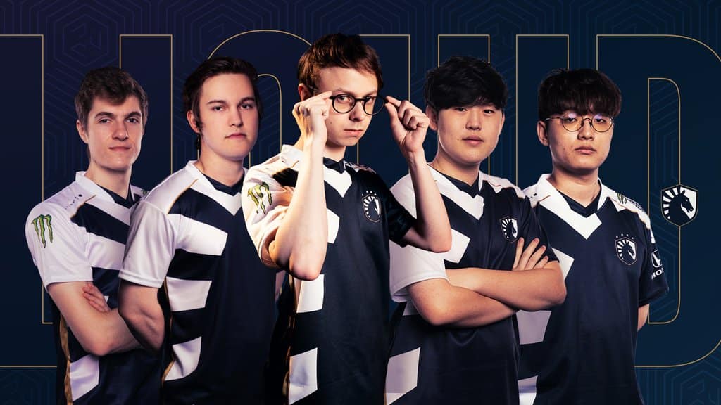 Pro LoL players Barney "Alphari" Morris, Lucas "Santorin" Tao Kilmer Larsen, Nicolaj "Jensen" Jensen, Edward "Tactical" Ra, Jo "CoreJJ" Yong-in stand together in Team Liquid jerseys in front of the outlined word "Liquid" as the background in dark blue
