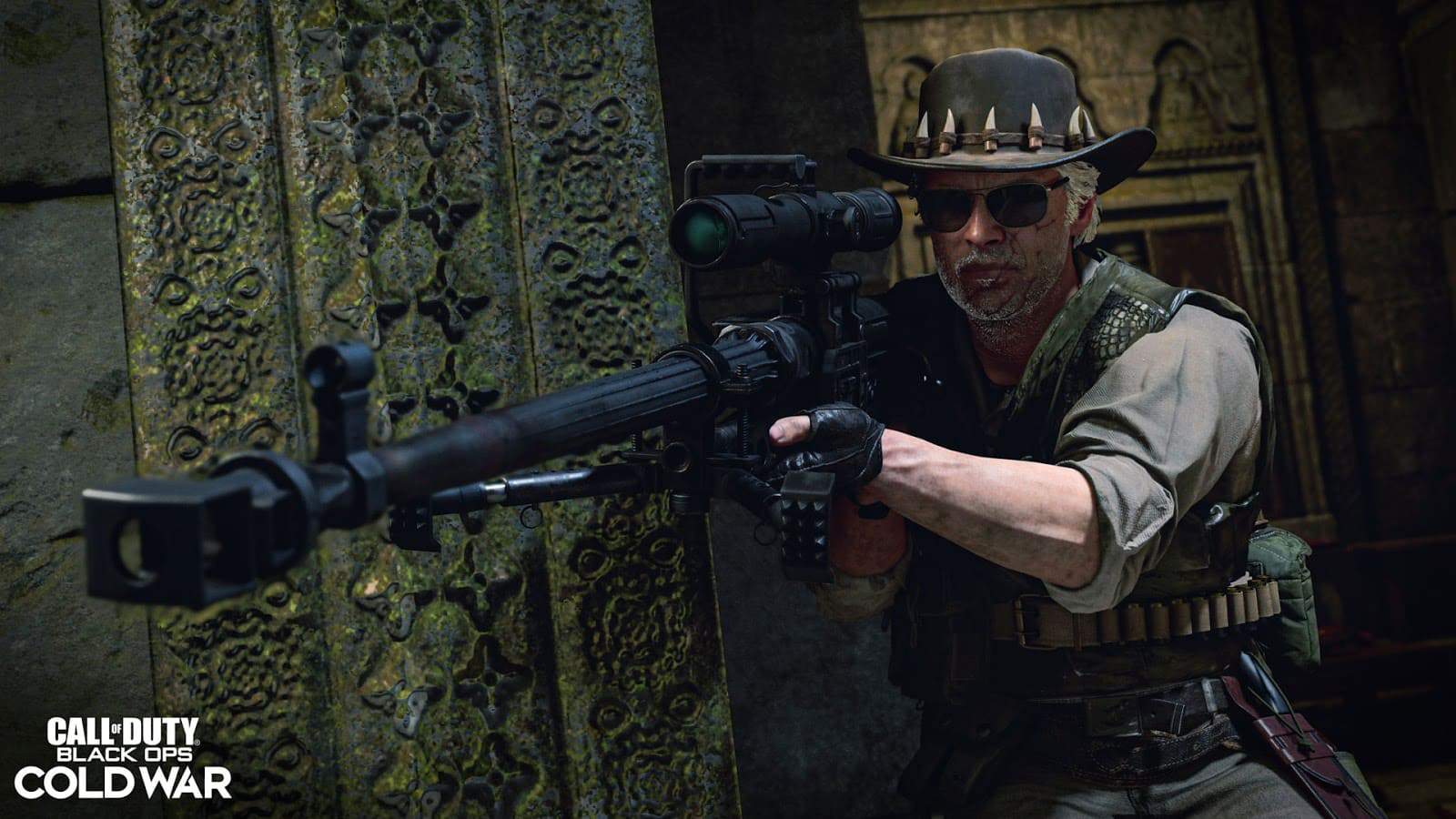 An older soldier with white hair holds a large sniper rifle, the ZRG 20mm, and aims down its scope. The Call of Duty Black Ops Cold War logo is in the corner