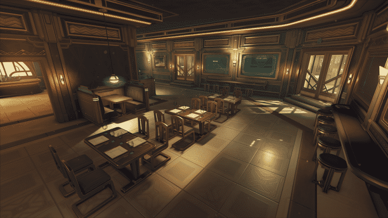 A modern dining/sitting area is shown with dim lighting and a futuristic design from a map in Overwatch 2.