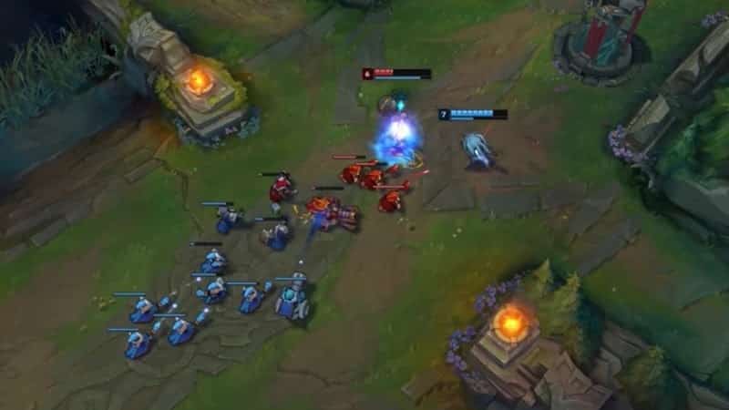 A screenshot from League of Legends showing a Fizz and Orianna fighting in the middle lane with a large blue minion wave advancing into a small red one.