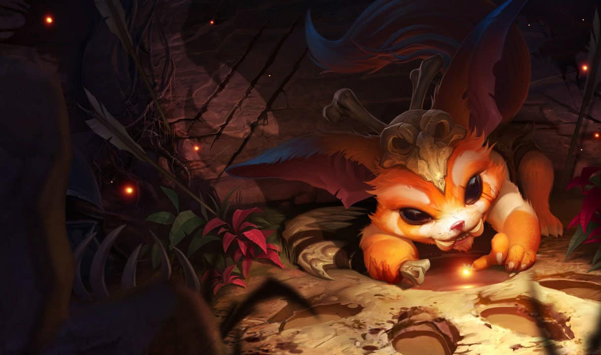 League of Legends champion Gnar splash art, showing the furry creature on the ground with his hands around a small bit of light