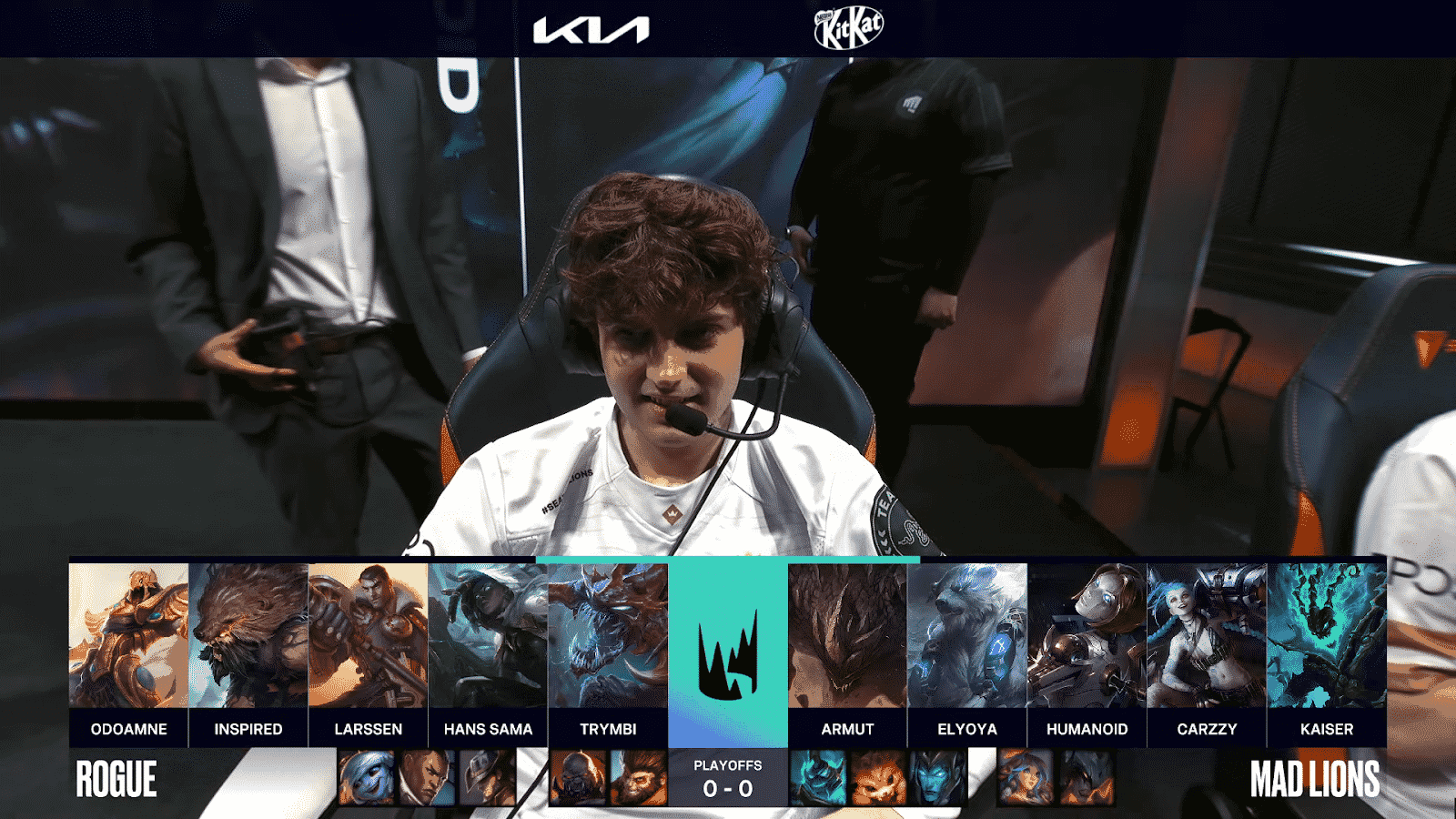 A screenshot from the LEC broadcast for Game One of the playoffs match between Rogue and MAD Lions. The picked and banned champion drafts appear at the bottom of the image with a shot of MAD Lions' Carzzy above.