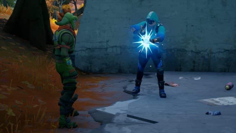 A screenshot showing a player holding a hammer surrouded by blue light, crafting an item