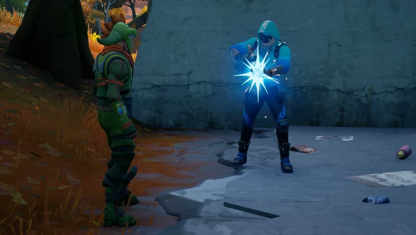 A screenshot showing a player holding a hammer surrouded by blue light, crafting an item