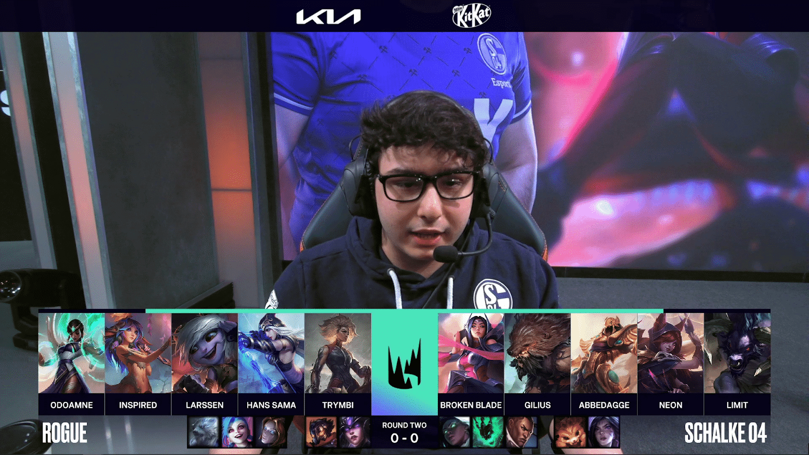 A screenshot from the LEC broadcast for Game One of the playoffs match between Schalke 04 and Rogue. The picked and banned champion drafts appear at the bottom of the image with a shot of S04 Broken Blade above.