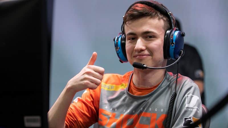 Pro Overwatch player Matthew "super" DeLisi smiles and gives a thumbs up on the OWL stage.