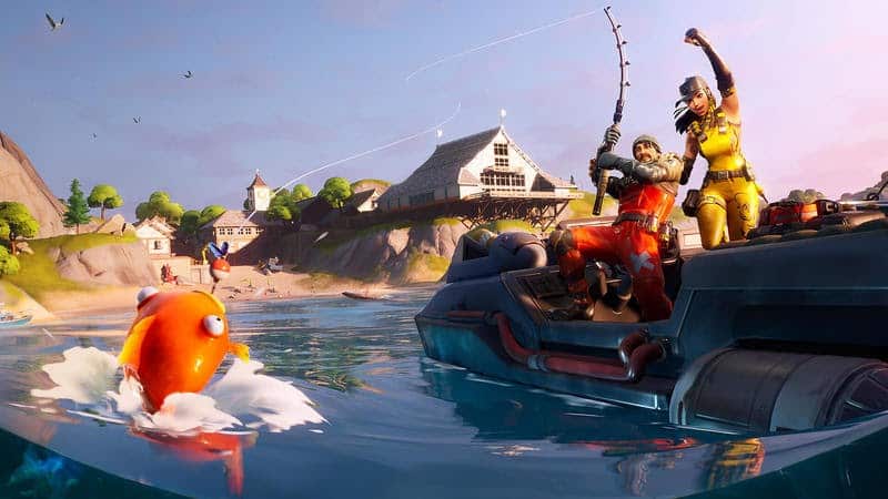 A male Fortnite character reels in an orange fish on a boat with a female character cheering him on.
