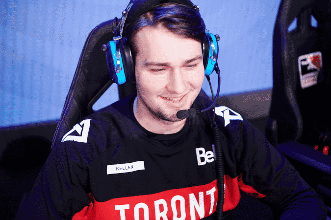 Overwatch League player formerly of the Toronto Defiant Kristian "Kellex" Keller smiles as he plays an OWL match on stage.