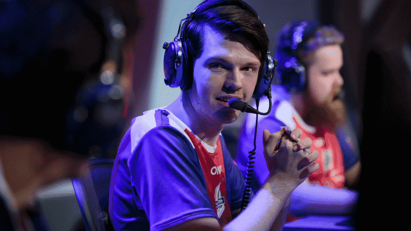 Pro Overwatch League player Stefan "Onigod" Fiskerstrand talks to his teammates on the OWL stage.