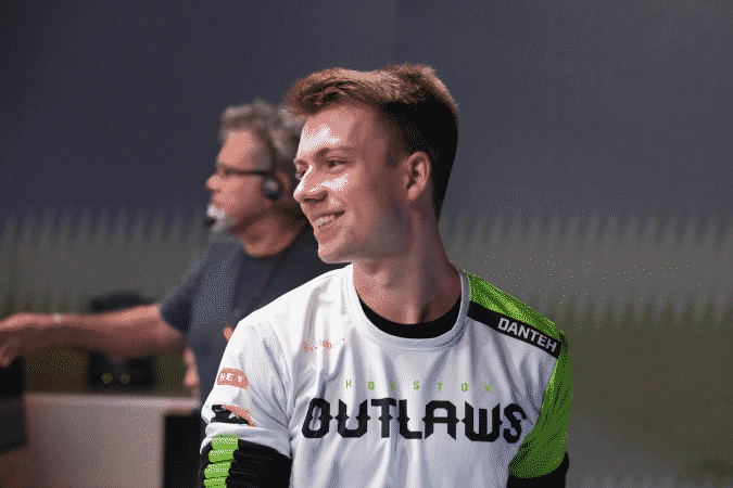 Dante "Danteh" Cruz smiles at a team mate off camera