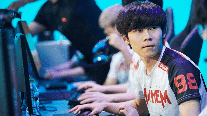 Beom-jun "Gargoyle" Lee in his Florida Mayhem jersey, turns toward a team mate during a live game of Overwatch