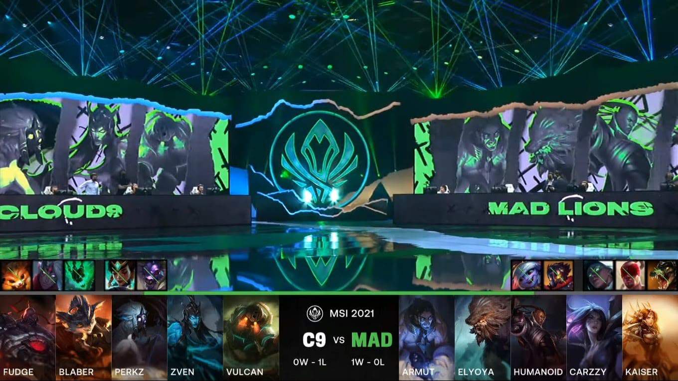 A screenshot from the LoL Esports broadcast for the Mid-Season Invitational (MSI) match between Cloud9 and MAD Lions. The picked and banned champion drafts appear at the bottom of the image with a shot of the 2021 MSI Stage above.