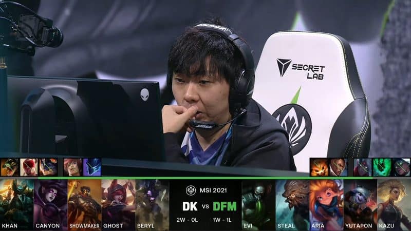 A screenshot from the LoL Esports broadcast for the Mid-Season Invitational (MSI) match between DAMWON KIA and Detonation FocusMe. The picked and banned champion drafts appear at the bottom of the image with a shot of DFM Yutapon above.