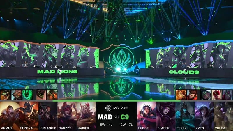 A screenshot from the LoL Esports broadcast for the Mid-Season Invitational (MSI) match between MAD Lions and Cloud9. The picked and banned champion drafts appear at the bottom of the image with a shot of the 2021 MSI stage above.