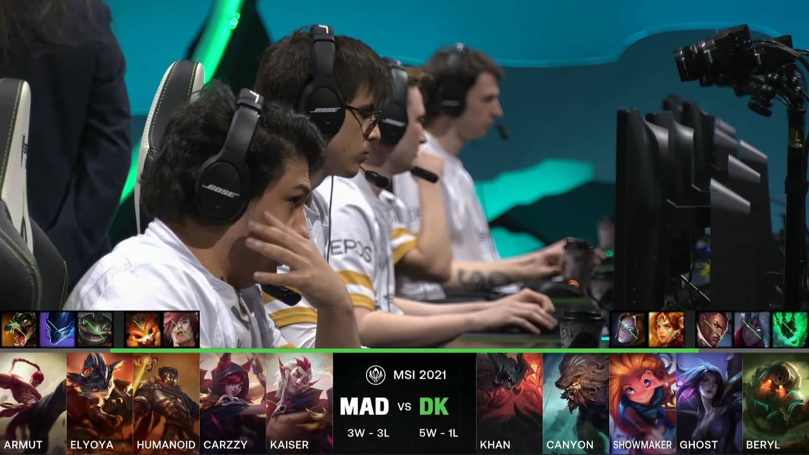 A screenshot from the LoL Esports broadcast for the Mid-Season Invitational (MSI) match between MAD Lions and DAMWON KIA. The picked and banned champion drafts appear at the bottom of the image with a shot of the MAD Lions LoL squad above.
