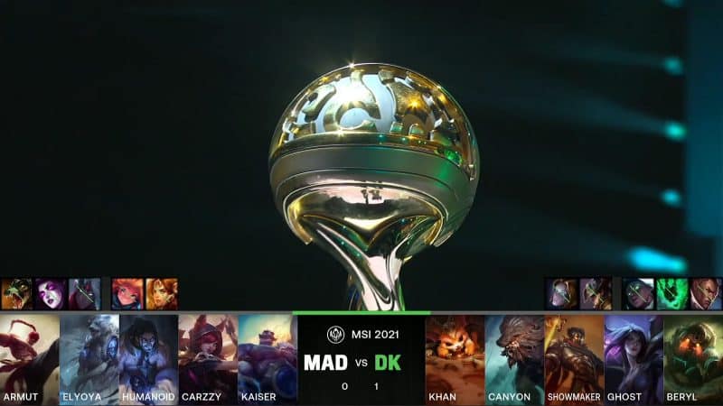A screenshot from the LoL Esports broadcast for the Mid-Season Invitational (MSI) Semifinal match between MAD Lions and DAMWON KIA. The picked and banned champion drafts appear at the bottom of the image with a shot of the top of the MSI trophy above.